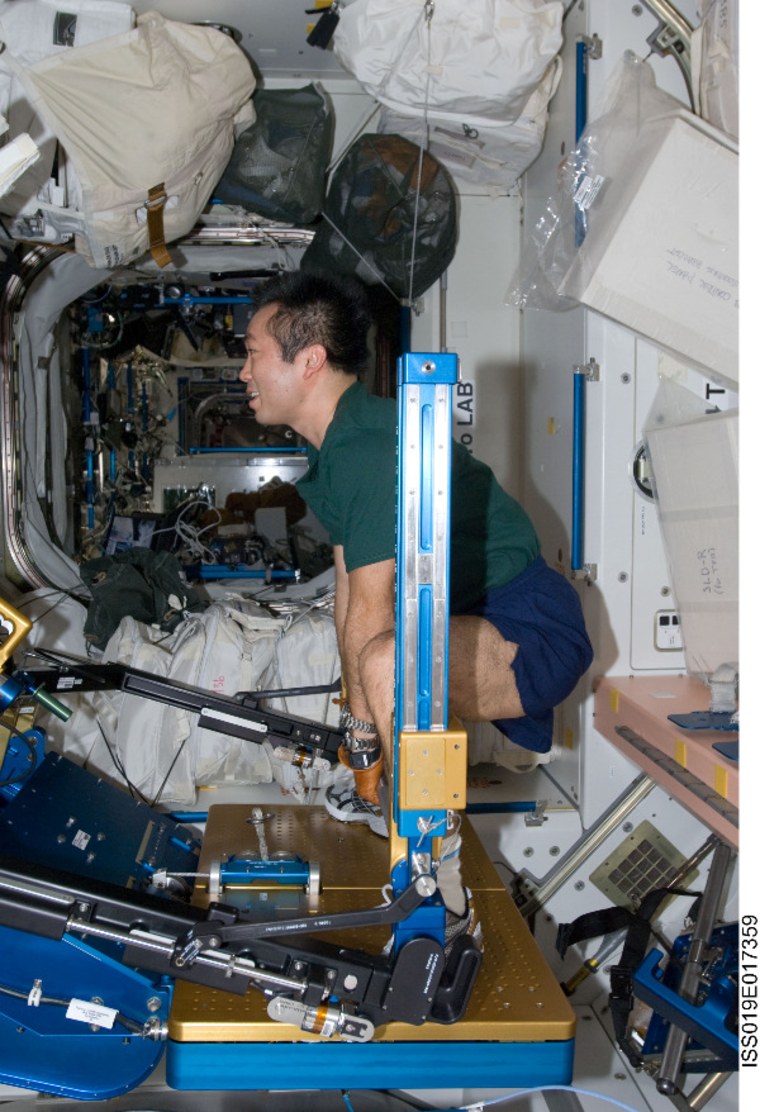Japan Aerospace Exploration Agency astronaut Koichi Wakata exercises using the Advanced Resistive Exercise Device in the International Space Station.